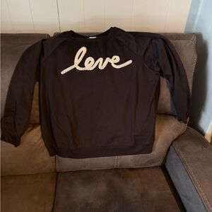 Black Sweatshirt with White 'Love' Script in pearls. Only worn twice.